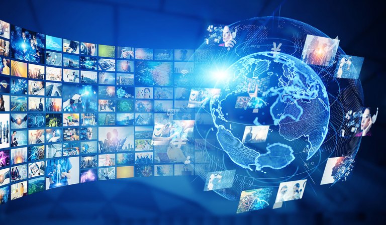 This image features a digital collage that visually represents the concept of global connectivity and the flow of information. A glowing, wireframe globe is central, surrounded by numerous smaller images depicting various people, technologies, and scenes, suggesting a diverse array of global activities and industries connected through digital networks.