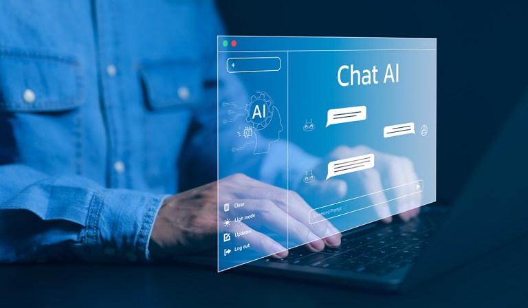 Image features a person using a laptop to interact with an artificial intelligence chat interface. The laptop screen displays a graphical user interface labeled "Chat AI", with icons and elements related to AI technology such as a brain symbol, various gears, and dialogue bubbles. These elements suggest that the interface is designed for communicating with an AI. The user, who is not fully visible, appears to be wearing a denim jacket, suggesting a casual or professional work setting. The overall image emphasizes modern technology and human interaction with AI systems.